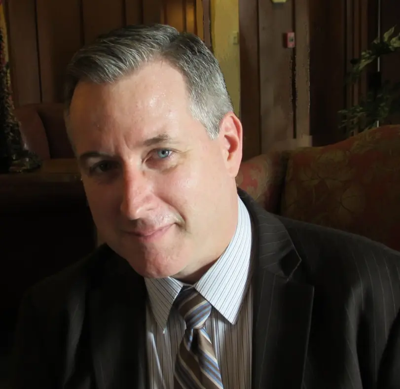 Edmund J. Gegan in a relaxed portrait